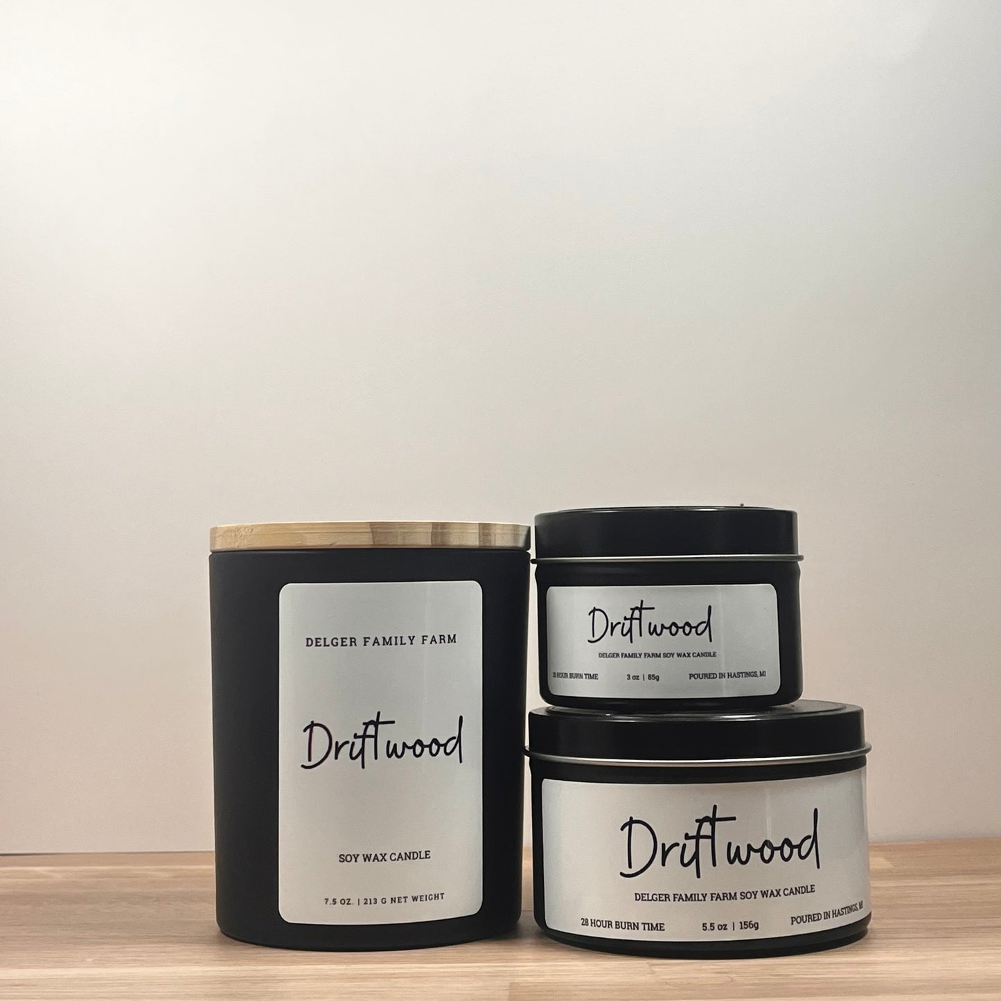 Black candles on wood
