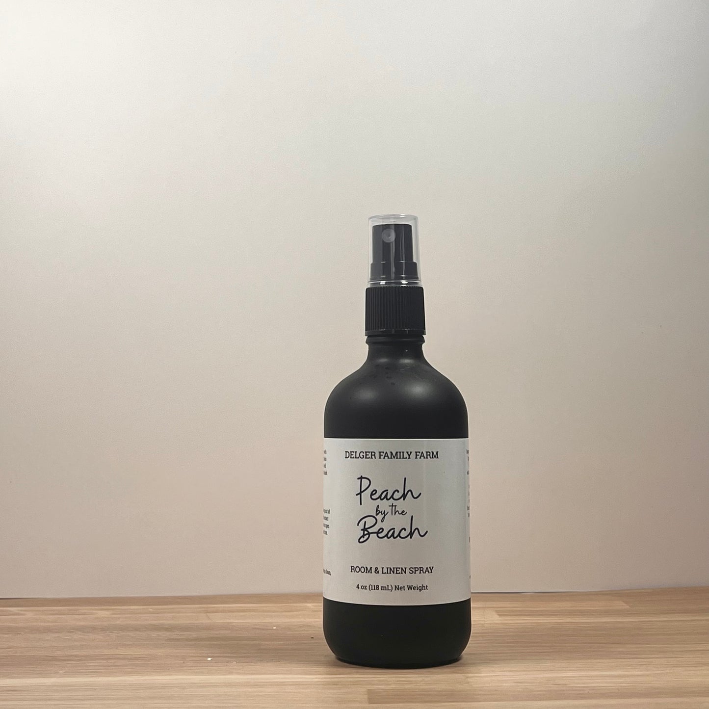 Black bottle on wood