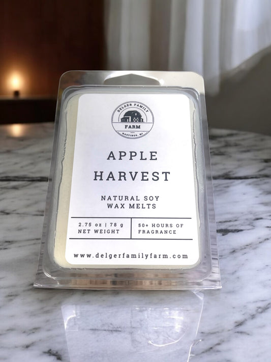 Pack of Apple Harvest natural soy wax melts on a marble surface with a blurred background