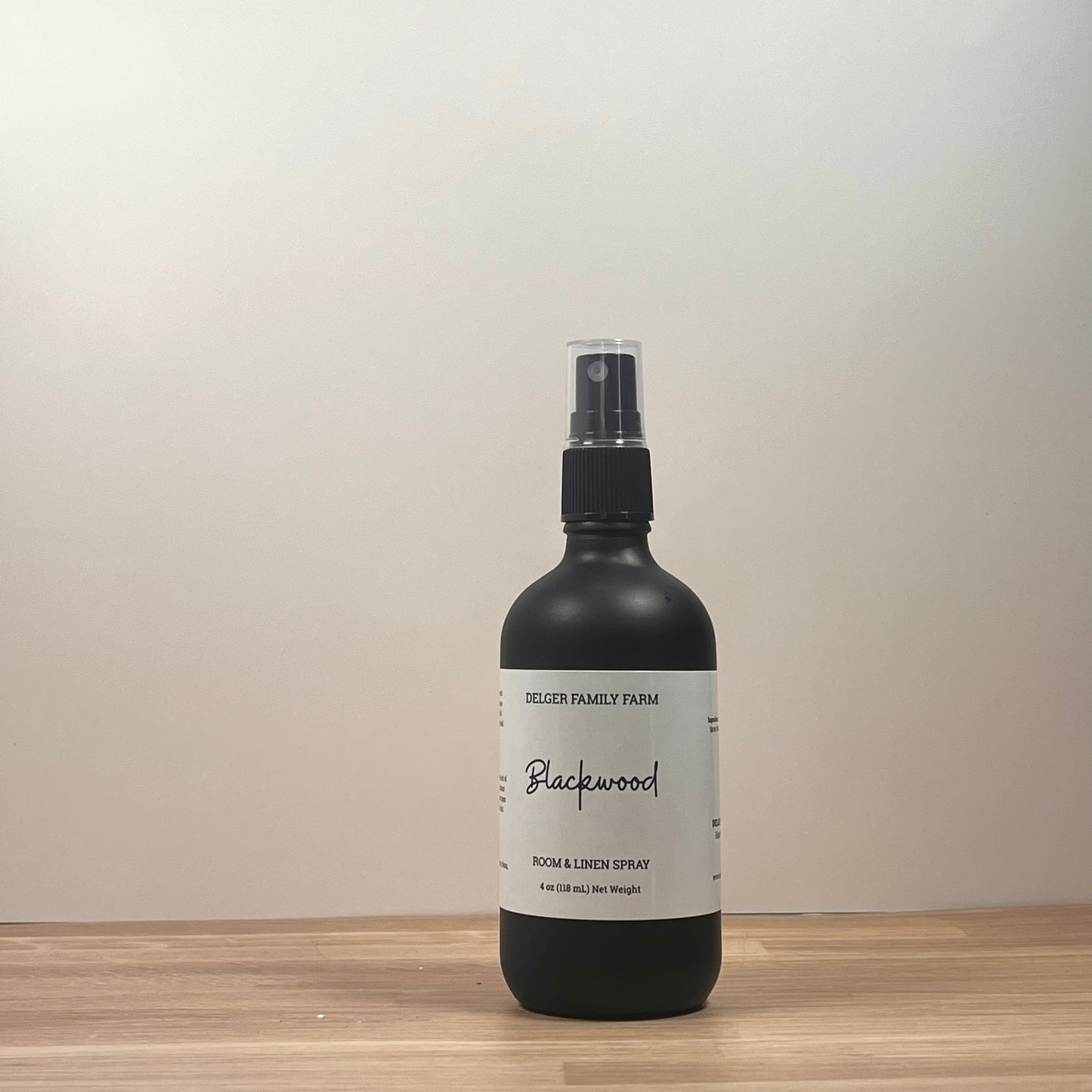 Black bottle on wood