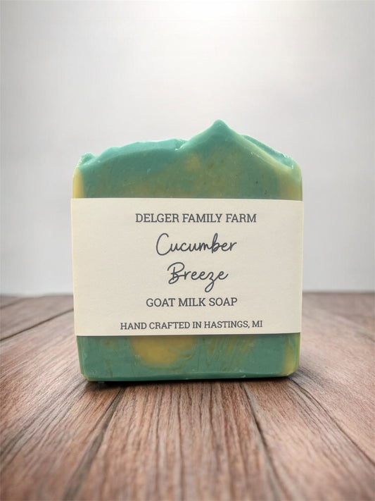 Goat milk soap bar with a label on a wooden surface