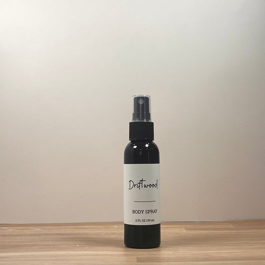 Black bottle on wooden surface