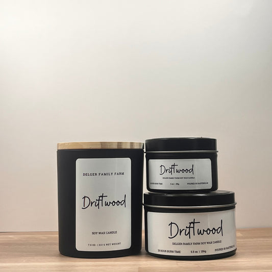 Black candles on wood