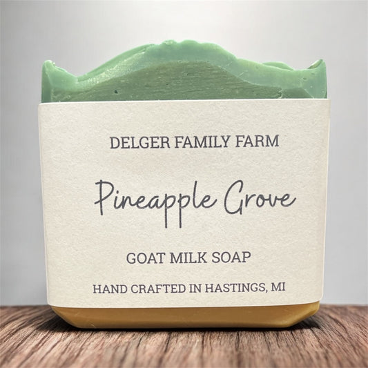 Goat milk soap from Delger Family Farm with a visible label on a wooden surface.