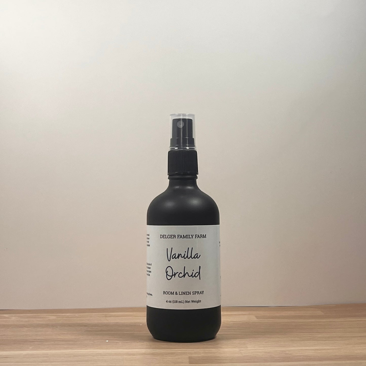 Black bottle on wood 