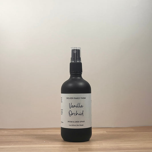 Black bottle on wood 